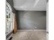 Cozy bedroom with vaulted ceiling, large window, and neutral carpet at 2350 Shore View Nw Way, Suwanee, GA 30024