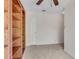 Bonus room or office featuring neutral carpet and built in shelves and crown molding at 2350 Shore View Nw Way, Suwanee, GA 30024