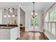 Open concept kitchen and breakfast nook with plenty of natural light at 2350 Shore View Nw Way, Suwanee, GA 30024
