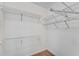 Walk-in closet with custom shelving to keep things organized at 2350 Shore View Nw Way, Suwanee, GA 30024