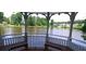 Scenic lake view from the community gazebo with benches for relaxation and peaceful enjoyment at 2350 Shore View Nw Way, Suwanee, GA 30024