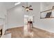 Bright living room with hardwood floors, vaulted ceilings, fireplace and open access to other rooms at 2350 Shore View Nw Way, Suwanee, GA 30024