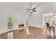 Spacious living room with vaulted ceilings, a fireplace, and access to the deck at 2350 Shore View Nw Way, Suwanee, GA 30024