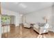 Open concept living room with lots of natural light from the large windows at 2350 Shore View Nw Way, Suwanee, GA 30024