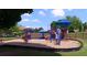 Community playground featuring colorful play structures, slides, and swings for enjoyment at 2350 Shore View Nw Way, Suwanee, GA 30024