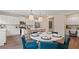Gourmet kitchen with stainless steel appliances, white cabinets, and an island with bar seating at 2447 Cadenza Cir, Dacula, GA 30019