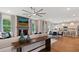 Open living space featuring a modern kitchen, a dining area, and a spacious living room at 2447 Cadenza Cir, Dacula, GA 30019