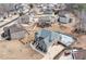 Aerial view showcases a home with a backyard pool within a neighborhood at 2994 Ash Grove Sw Dr, Conyers, GA 30094