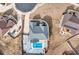 Overhead aerial view of backyard with in-ground pool and patio in a residential neighborhood at 2994 Ash Grove Sw Dr, Conyers, GA 30094