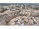 Expansive aerial view showcases the neighborhood's winding streets, mature trees, and well-maintained homesites at 2994 Ash Grove Sw Dr, Conyers, GA 30094