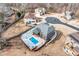Aerial view of a beautiful home featuring a private backyard oasis with a sparkling swimming pool at 2994 Ash Grove Sw Dr, Conyers, GA 30094