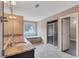 Bright bathroom featuring double vanity, soaking tub, and glass-enclosed shower at 2994 Ash Grove Sw Dr, Conyers, GA 30094