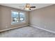 Bright bedroom with carpet and large window offering nice natural light and view at 2994 Ash Grove Sw Dr, Conyers, GA 30094