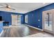 Bonus room featuring a sliding barn door and access to the pool at 2994 Ash Grove Sw Dr, Conyers, GA 30094