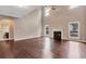 Expansive living room boasting vaulted ceiling, fireplace, and abundant natural light at 2994 Ash Grove Sw Dr, Conyers, GA 30094