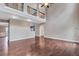 Spacious living room featuring hardwood floors and a staircase to the second level at 2994 Ash Grove Sw Dr, Conyers, GA 30094