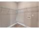 Walk-in closet with installed wire rack shelving at 2994 Ash Grove Sw Dr, Conyers, GA 30094