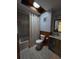 Bathroom featuring a tub with shower, toilet, vanity and wood-look tile at 406 Vivian Way, Woodstock, GA 30188