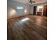 Spacious bedroom with wood floors and built in vanity and closet at 406 Vivian Way, Woodstock, GA 30188