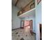 Open foyer with high ceilings, decorative tile flooring, and french doors to office at 406 Vivian Way, Woodstock, GA 30188