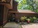 Exterior shot of a home's front entrance with simple landscaping at 406 Vivian Way, Woodstock, GA 30188