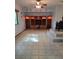 Cozy living room with built-in shelving and a modern wood-burning stove at 406 Vivian Way, Woodstock, GA 30188