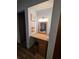Bedroom nook with vanity, shelving, drawers, and wood-look floors at 406 Vivian Way, Woodstock, GA 30188