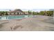 Beautiful community pool with clubhouse and plenty of seating for relaxing and socializing at 7095 Evening Dew Dr, Cumming, GA 30028