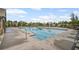 Community swimming pool with lounge chairs and a sun deck for residents at 7095 Evening Dew Dr, Cumming, GA 30028