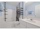 Cozy bathroom with a shower-tub combo, storage shelves, and a sink vanity for all your needs at 1065 Dalby Way, Austell, GA 30106
