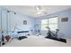 Well-lit exercise room with various workout machines, providing ample space for fitness activities at 1065 Dalby Way, Austell, GA 30106