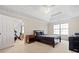 Spacious main bedroom with tray ceiling, and adjoining room perfect for exercise equipment and additional space at 1065 Dalby Way, Austell, GA 30106