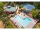 Aerial view of community pool, clubhouse, playground and tennis courts at 1065 Dalby Way, Austell, GA 30106