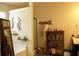 Stylish bathroom with a bathtub, walk-in shower, and modern fixtures for a luxurious experience at 1231 St James Pl, Loganville, GA 30052