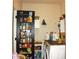 Practical laundry room with shelving and storage solutions, enhancing functionality and organization at 1231 St James Pl, Loganville, GA 30052