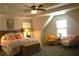 Inviting primary bedroom showcasing neutral tones, complemented by soft furnishings and a serene ambiance at 1231 St James Pl, Loganville, GA 30052