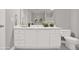 Clean bathroom featuring a vanity with great storage and a toilet at 132 Tara Commons Dr, Loganville, GA 30052