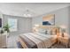 Cozy bedroom with soft lighting, a comfortable bed, and stylish décor at 132 Tara Commons Dr, Loganville, GA 30052