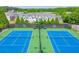 Aerial view of Tara Club tennis courts and surrounding residential neighborhood at 132 Tara Commons Dr, Loganville, GA 30052