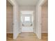 Bright bathroom featuring a standalone tub, modern fixtures and neutral paint at 2436 Cadenza Cir, Dacula, GA 30019