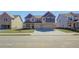 Charming two-story home with brick facade, a two-car garage, and a well-manicured front lawn at 2436 Cadenza Cir, Dacula, GA 30019