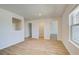 Room with wood floors, providing easy access to a walk-in closet and other spaces at 2436 Cadenza Cir, Dacula, GA 30019