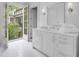 Bathroom featuring a double vanity and access to an outdoor balcony at 3625 Tuxedo Nw Rd, Atlanta, GA 30305