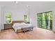 Serene bedroom with large windows, hardwood floors, and neutral decor at 3625 Tuxedo Nw Rd, Atlanta, GA 30305