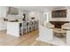 Bright, open kitchen with a large island, modern appliances, and stylish seating area at 3625 Tuxedo Nw Rd, Atlanta, GA 30305