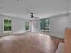 Spacious living room with hardwood floors, recessed lighting, and large windows at 3625 Tuxedo Nw Rd, Atlanta, GA 30305
