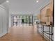 Open floor plan with black framed windows and doors, light walls and wood floors create a great atmosphere at 3625 Tuxedo Nw Rd, Atlanta, GA 30305