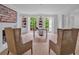 Bright home office with built-in shelves, a large window, and stylish decor at 3625 Tuxedo Nw Rd, Atlanta, GA 30305