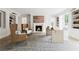 Elegant home office with custom built-ins, a cozy fireplace, and stylish decor at 3625 Tuxedo Nw Rd, Atlanta, GA 30305