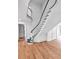 Elegant staircase with hardwood floors and white railing, showcasing architectural detail at 3625 Tuxedo Nw Rd, Atlanta, GA 30305